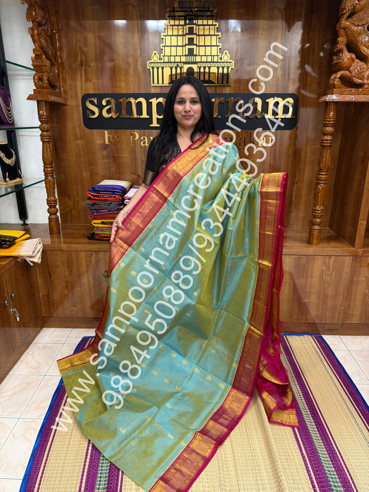 Teal Blue with Pink , Annam and Mango  Zari butta in the body , traditional Silk  border and rich Pallu Korvai Silk Cotton Saree