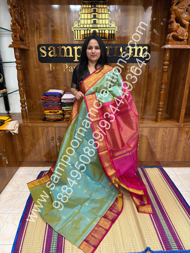 Teal Blue with Pink , Annam and Mango  Zari butta in the body , traditional Silk  border and rich Pallu Korvai Silk Cotton Saree
