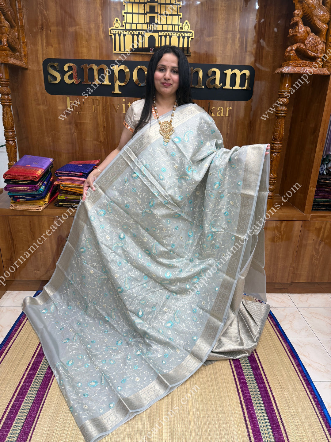 Pastel Blue , Mango and Floral  Embroidery in the body , Banarasi Border and Pallu Semi Kota Tissue Saree