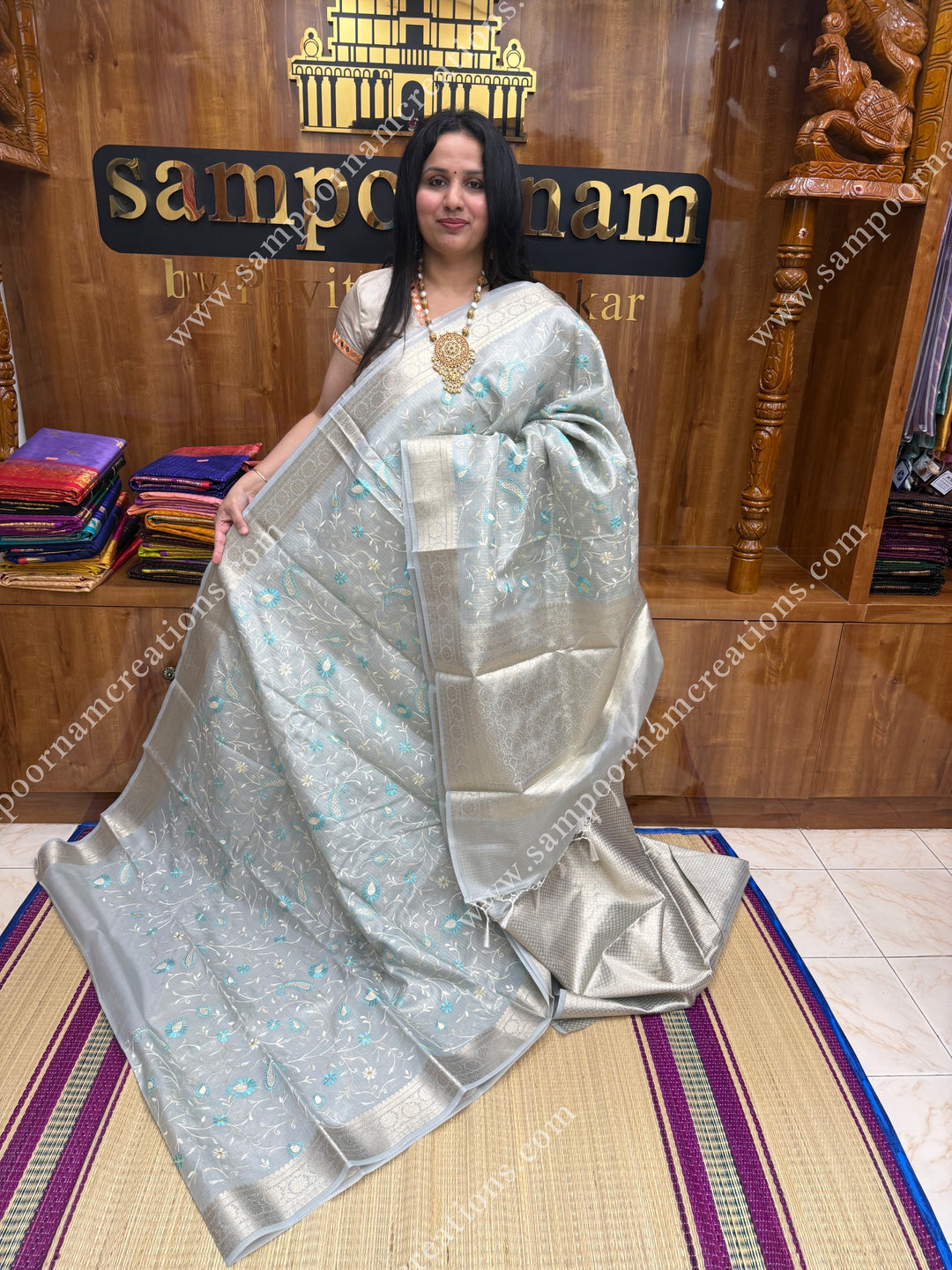 Pastel Blue , Mango and Floral  Embroidery in the body , Banarasi Border and Pallu Semi Kota Tissue Saree