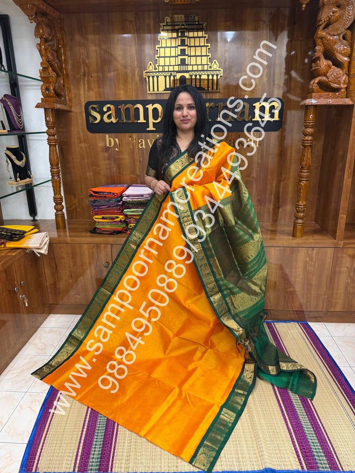 Mambazha Manjal with Green , Vairaoosi Zari Lines in the body , Traditional borders and rich Pallu Korvai Silk Cotton