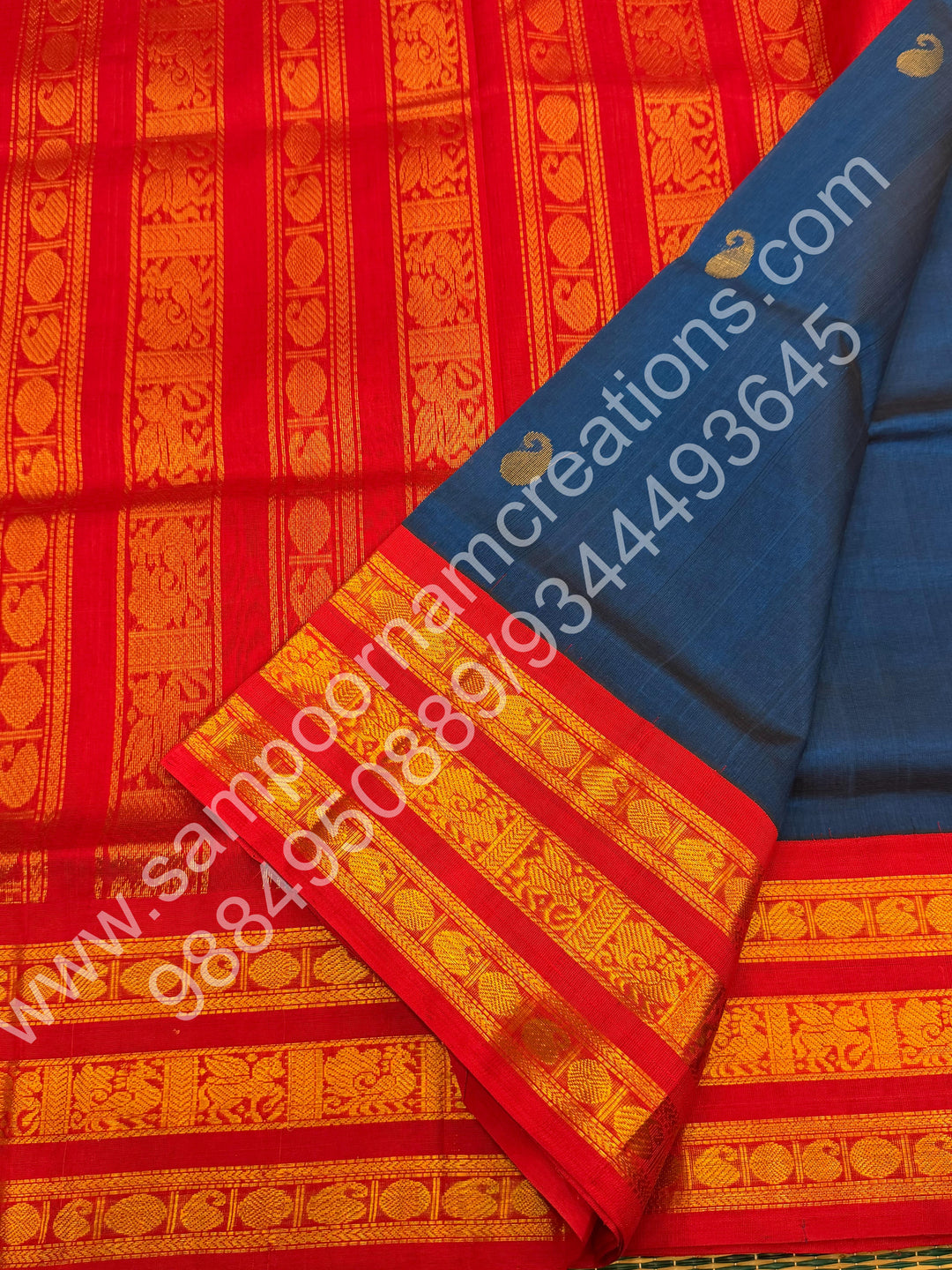 Sapphire Blue with Red  , Rich Rudraksh and Mango  Zari butta with Traditional Kanchi  Border and Rich Pallu Pure Korvai Silk Cotton Saree