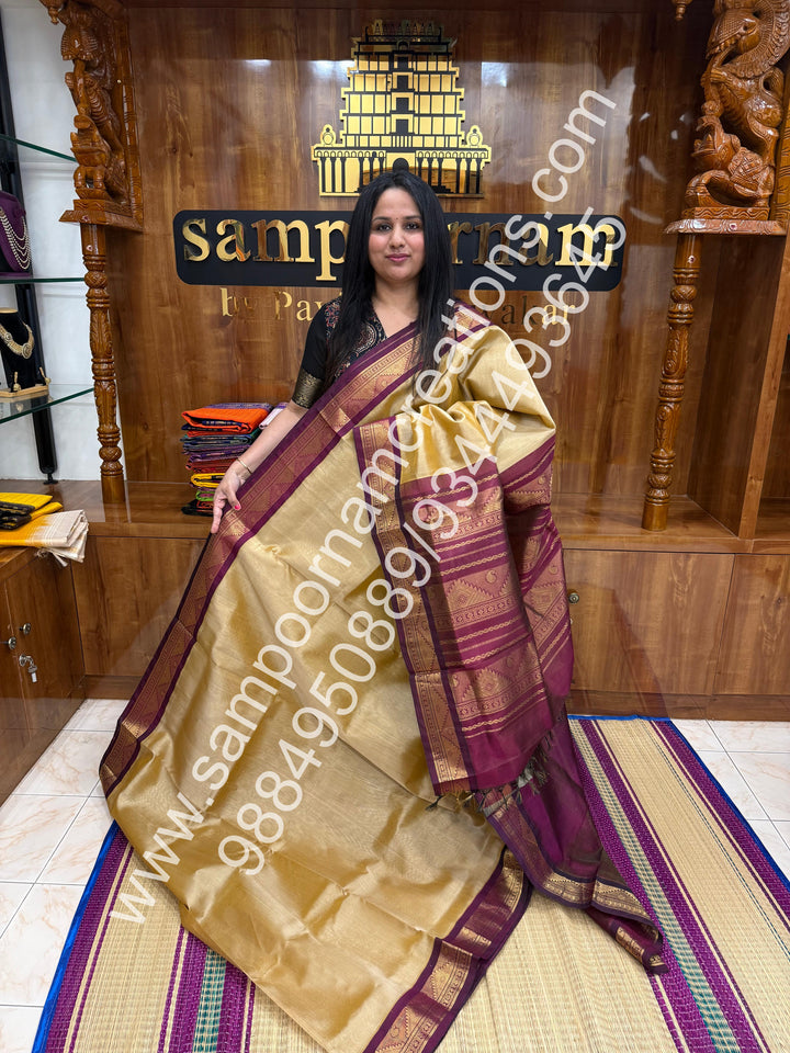 Gold with Wine , Vairaoosi Zari Lines in the body , Traditional borders and rich Pallu Korvai Silk Cotton