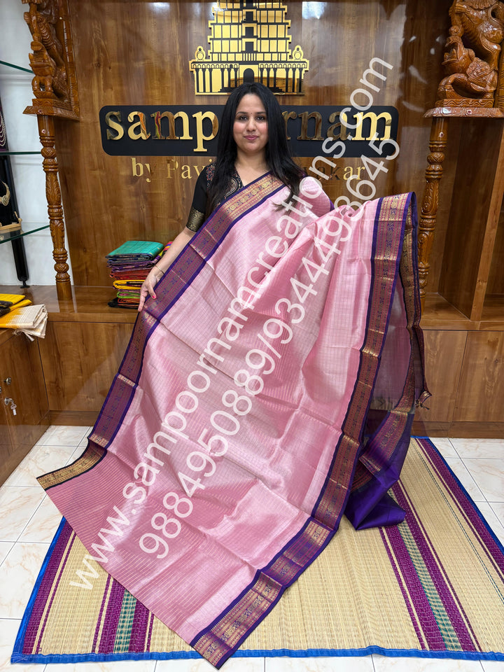 Baby Pink with Purple , rich Zari checks in the body , traditional borders and rich Pallu Korvai Silk Cotton