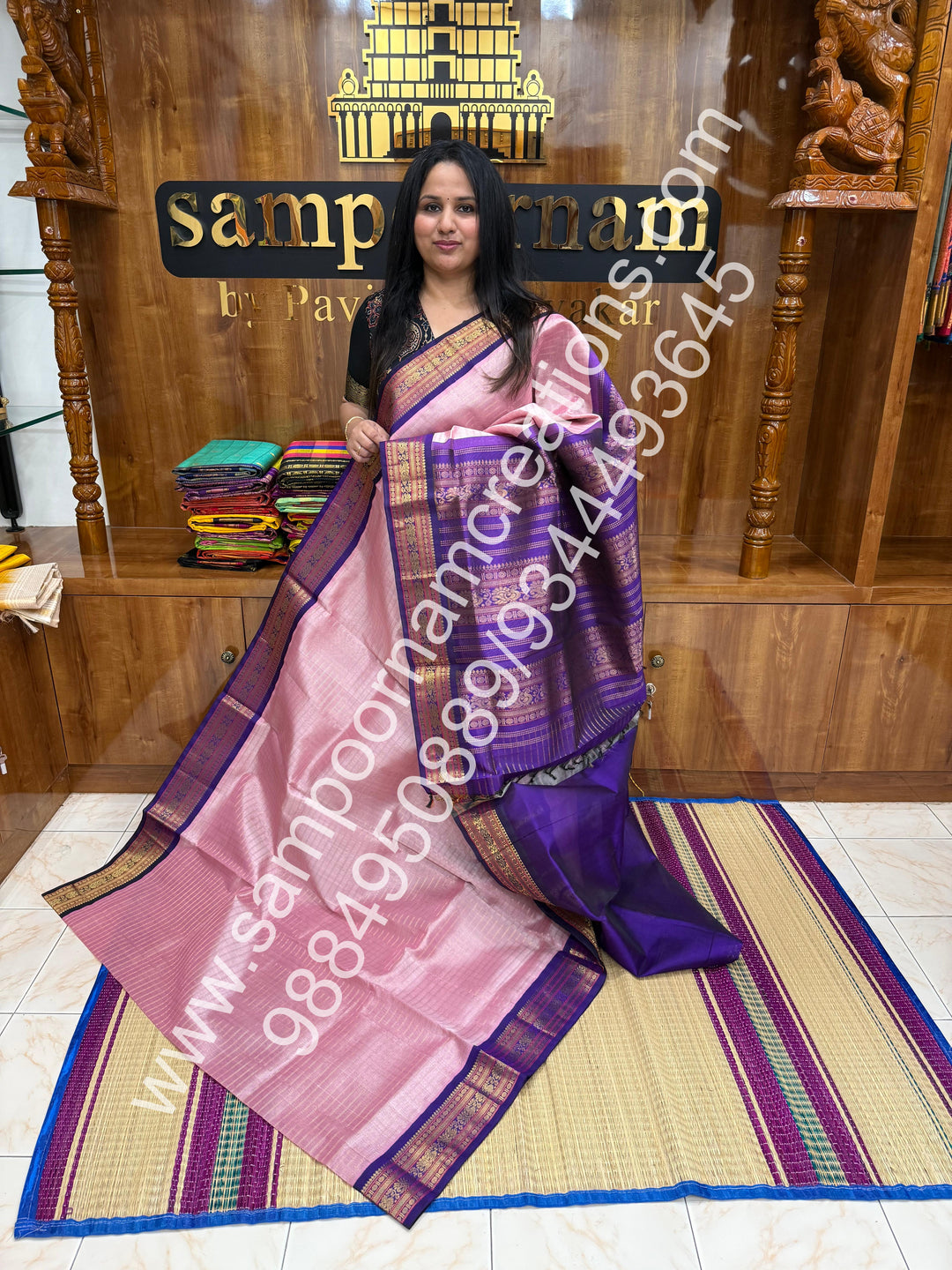 Baby Pink with Purple , rich Zari checks in the body , traditional borders and rich Pallu Korvai Silk Cotton