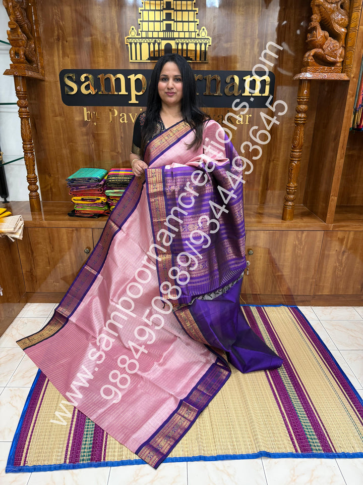 Baby Pink with Purple , rich Zari checks in the body , traditional borders and rich Pallu Korvai Silk Cotton