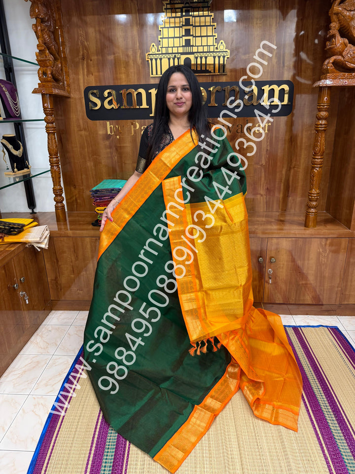 Dark Green with Manjal , Vairaoosi Zari Lines in the body , Traditional borders and rich Pallu Korvai Silk Cotton