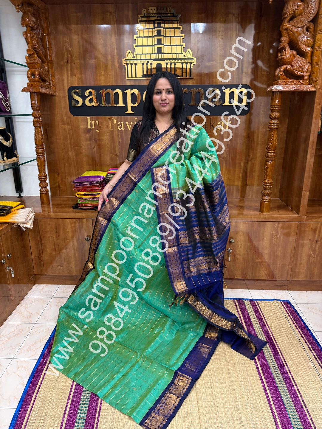 Double Shaded Ramar Blue , rich Zari checks with Mango  butta in the body , traditional  borders  and rich Pallu Korvai Silk Cotton Saree