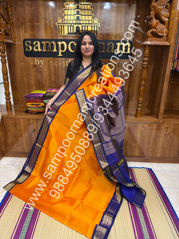 Mambazha Manjal with Dark Blue , Vairaoosi Zari Lines in the body , Traditional borders and rich Pallu Korvai Silk Cotton