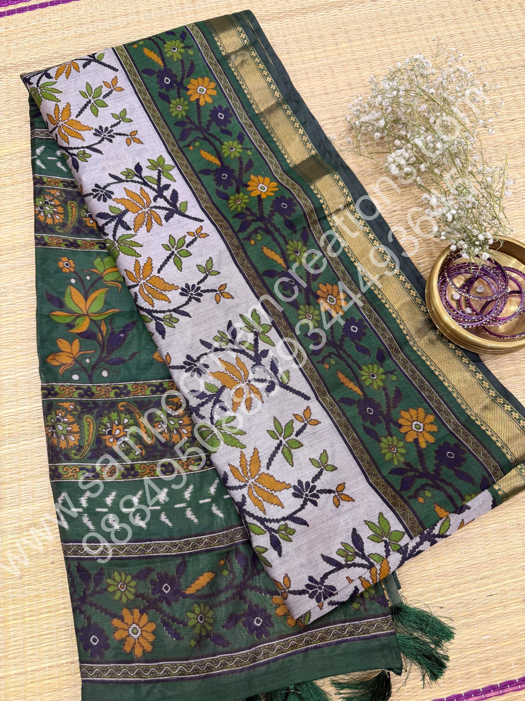 Grey with Green  , Floral Prints in the body , Printed Blouse and Tassels in the Pallu , Soft Cotton Saree