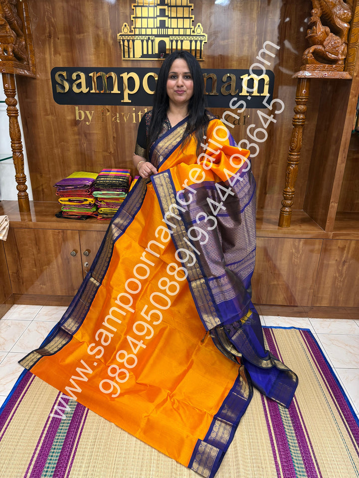 Mambazha Manjal with Dark Blue , Vairaoosi Zari Lines in the body , Traditional borders and rich Pallu Korvai Silk Cotton