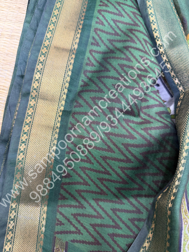 Grey with Green  , Floral Prints in the body , Printed Blouse and Tassels in the Pallu , Soft Cotton Saree
