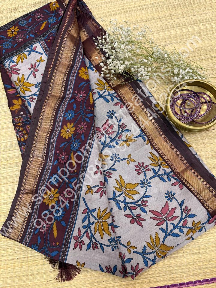 Grey with Arakku  , Floral Prints in the body , Printed Blouse and Tassels in the Pallu , Soft Cotton Saree