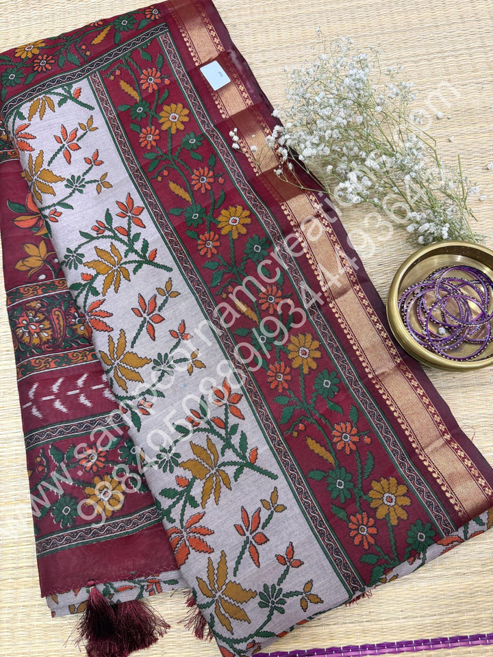 Grey with Red  , Floral Prints in the body , Printed Blouse and Tassels in the Pallu , Soft Cotton Saree