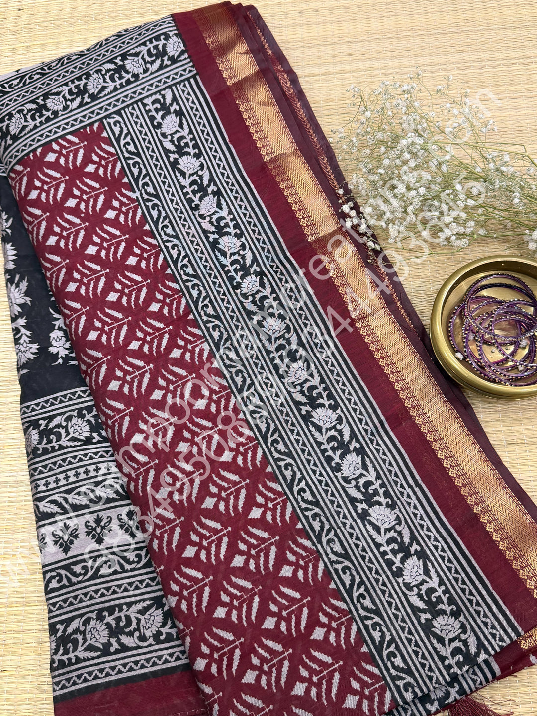 Red with Black  , Floral Prints in the body , Printed Blouse and Tassels in the Pallu , Soft Cotton Saree