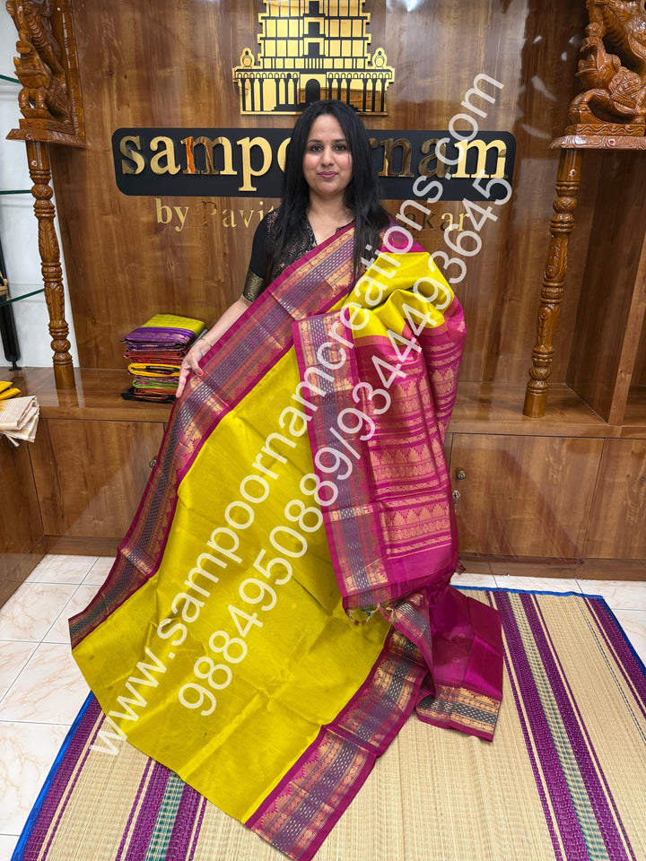 Gold Yellow with Magenta , rich Zari butta in the body and Lakshadeepam border , Grand Pallu Korvai Silk Cotton Saree