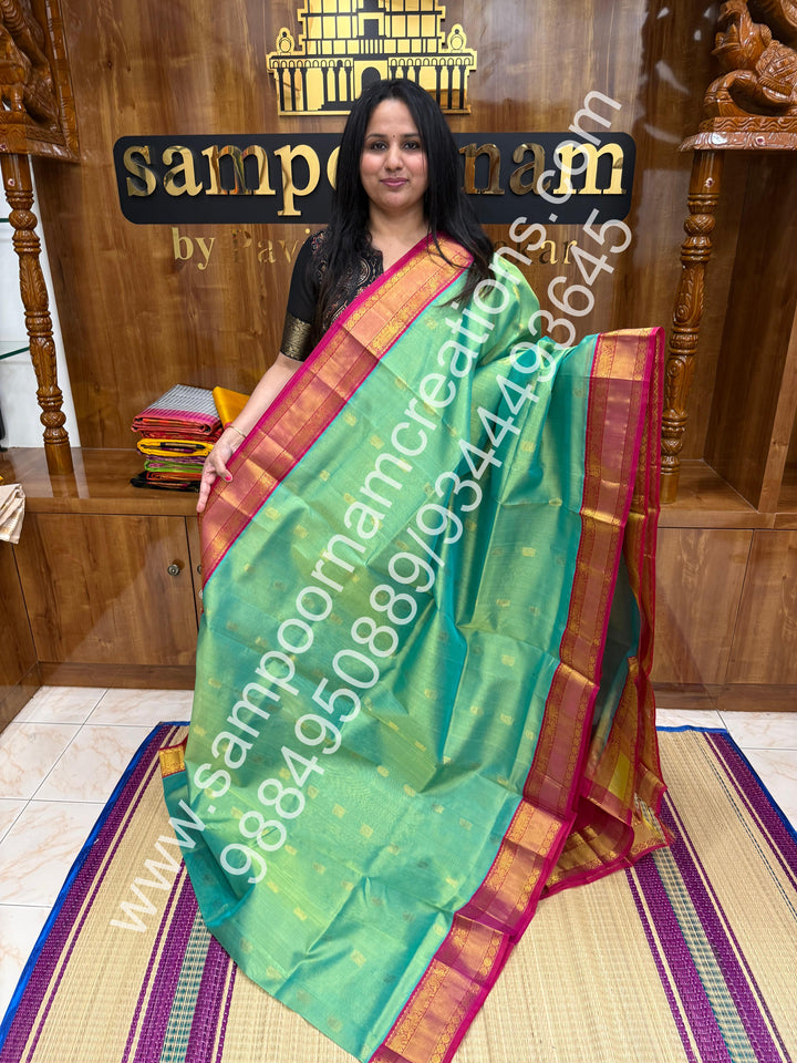 Double Shaded sea green with Pink, Annam and Mango  Zari butta in the body , traditional Silk  border and rich Pallu Korvai Silk Cotton Saree