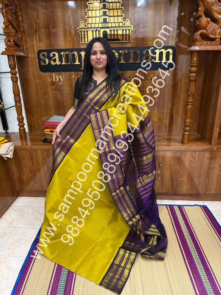 Mustard Yellow with Purple  , Traditional Kanchi  borders and rich Pallu Korvai Silk Cotton Saree