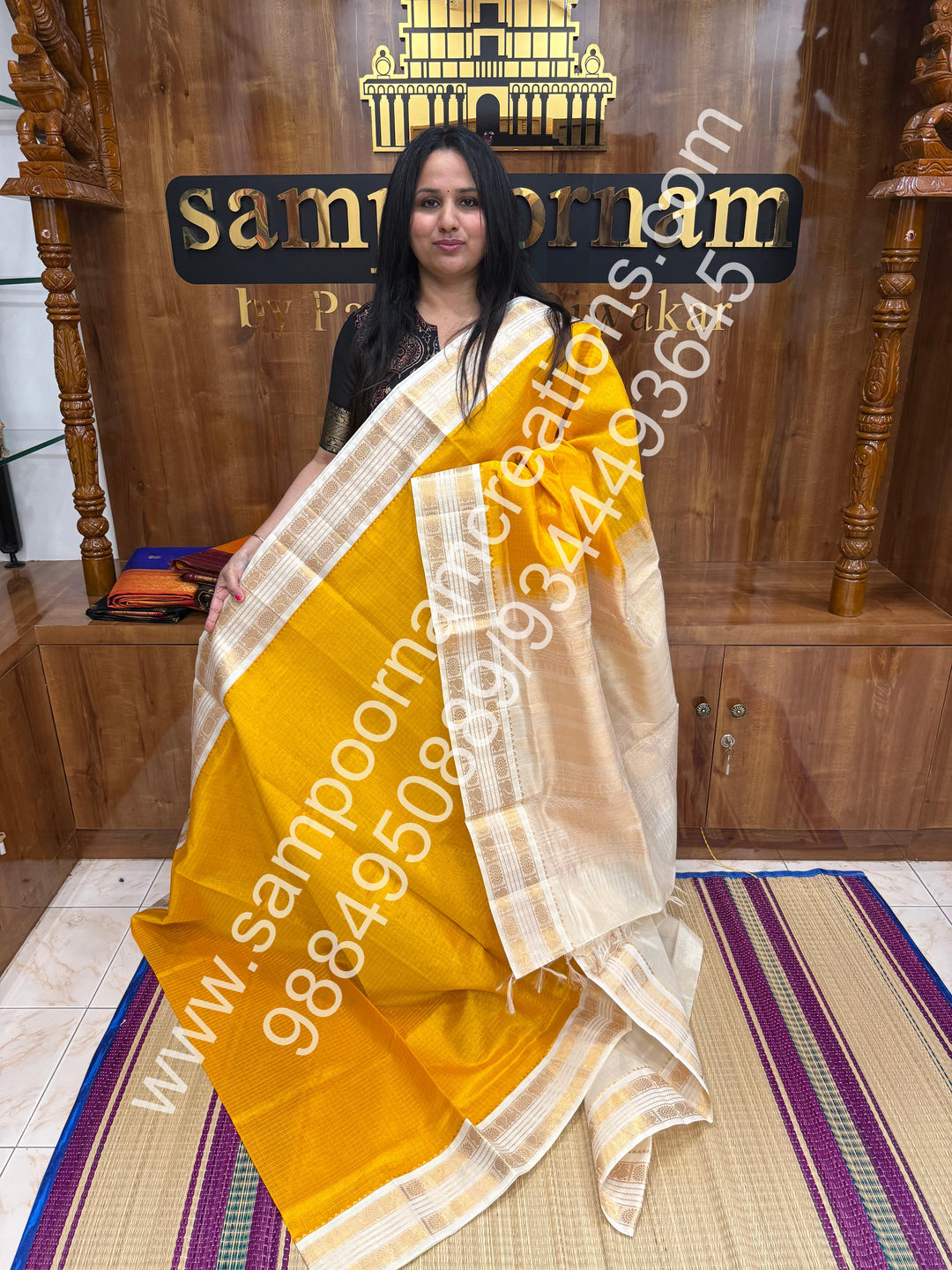 Yellow with Offwhite  , rich Zari checks in the body , rettapet  borders and rich Pallu Korvai Silk Cotton