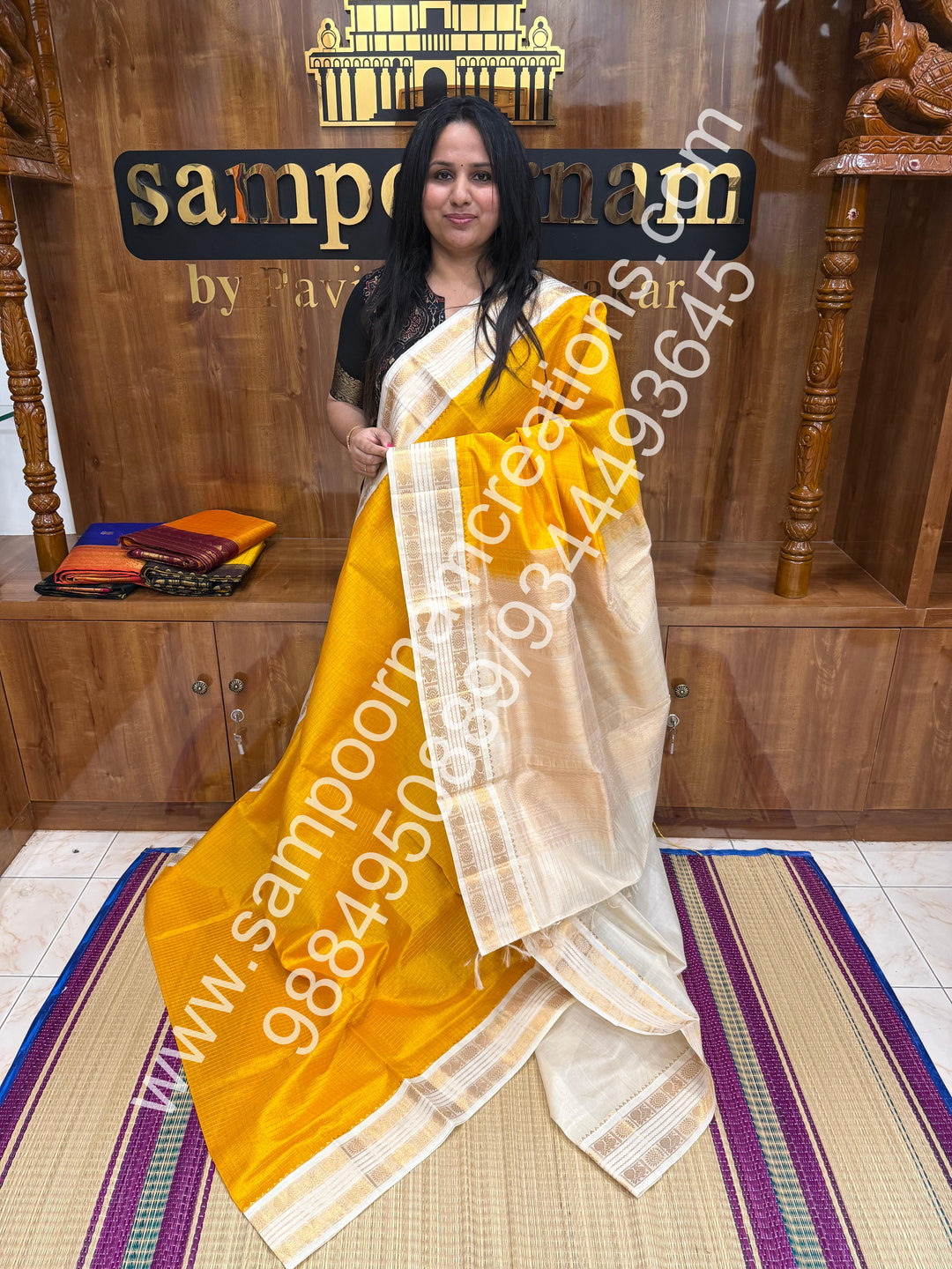 Yellow with Offwhite  , rich Zari checks in the body , rettapet  borders and rich Pallu Korvai Silk Cotton