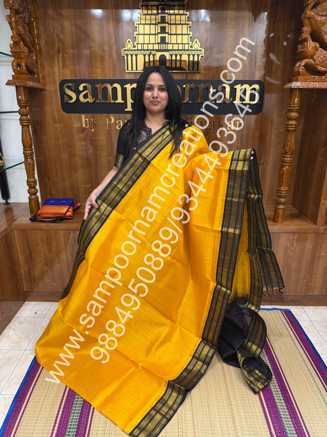 Manjal with Dark Brown  , rich Zari checks in the body , traditional borders and rich Pallu Korvai Silk Cotton