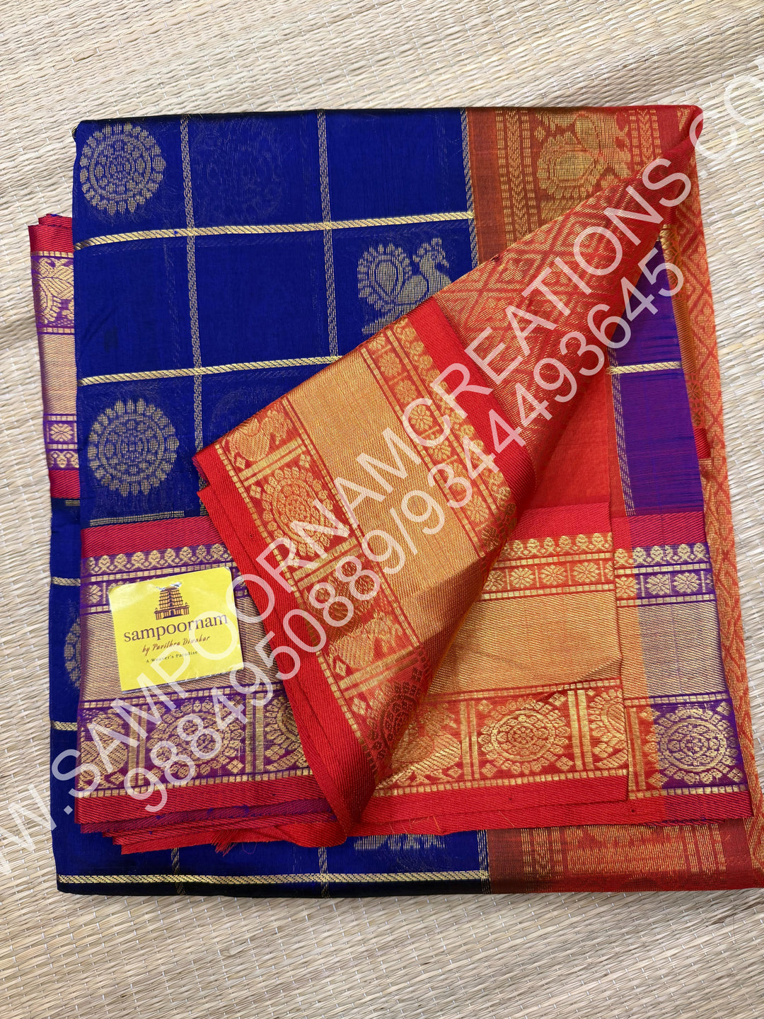 Dark Blue with Orange, Rich Mayil and Chakram Butta in the Body with Zari Checks, Traditional Borders and Rich Pallu, Pure Silk Cotton Saree