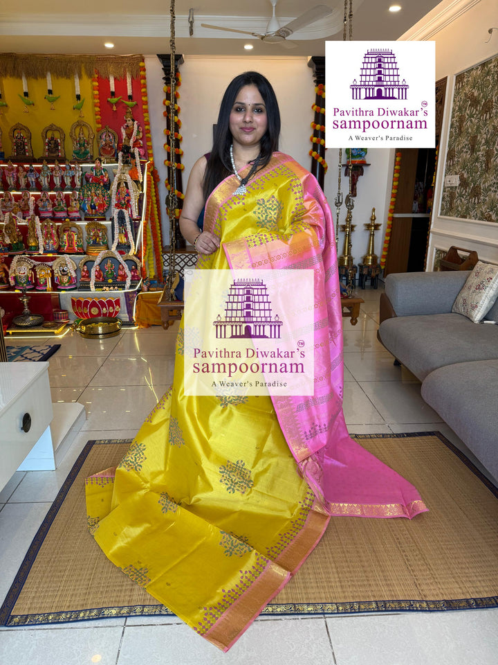 Yellow with Baby Pink , with rich Zari Butta in the Body ,traditional borders and rich Pallu silk cotton saree