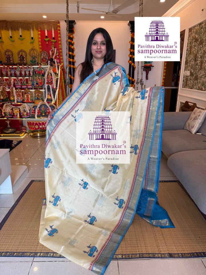 Offwhite with Blue , rich zari butta in the body , traditional borders , Terracota horse printed Silk Cotton Saree