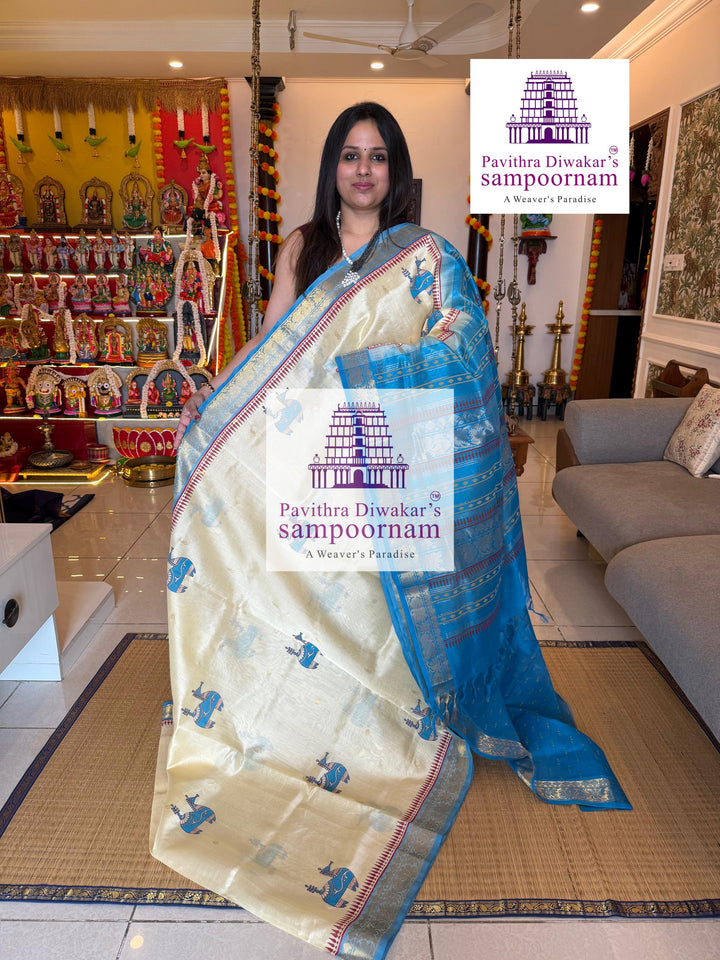 Offwhite with Blue , rich zari butta in the body , traditional borders , Terracota horse printed Silk Cotton Saree