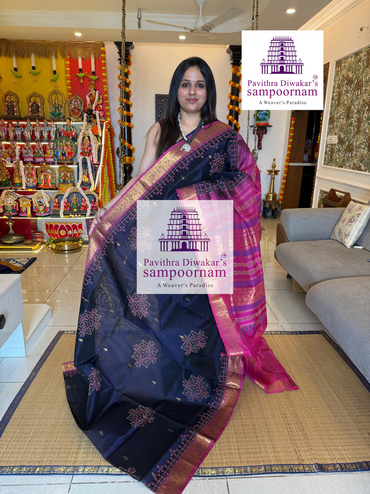 Dark Blue with Pink , rich Zari Butta in the Body ,traditional borders and rich Pallu silk cotton saree