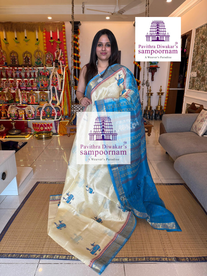 Offwhite with Blue , rich zari butta in the body , traditional borders , Terracota horse printed Silk Cotton Saree