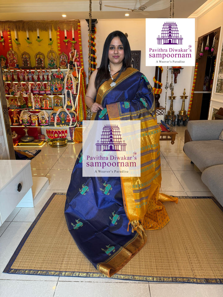Blue with Mustard , Vairaoosi Zari lines in the body ,  , rich zari butta in the body , traditional borders and rich pallu , Terracota horse printed Silk Cotton Saree