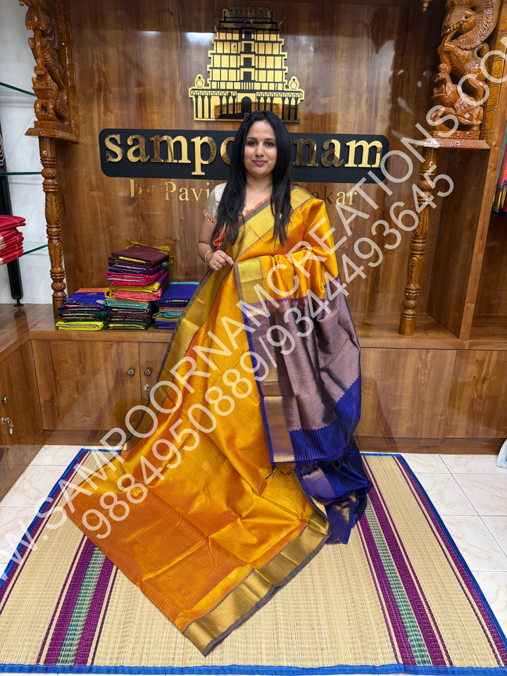 Goldish Yellow with Blue, Rich Mayil and Chakram Butta in the Body with Zari Checks, Traditional Borders and Rich Pallu, Pure Silk Cotton Saree