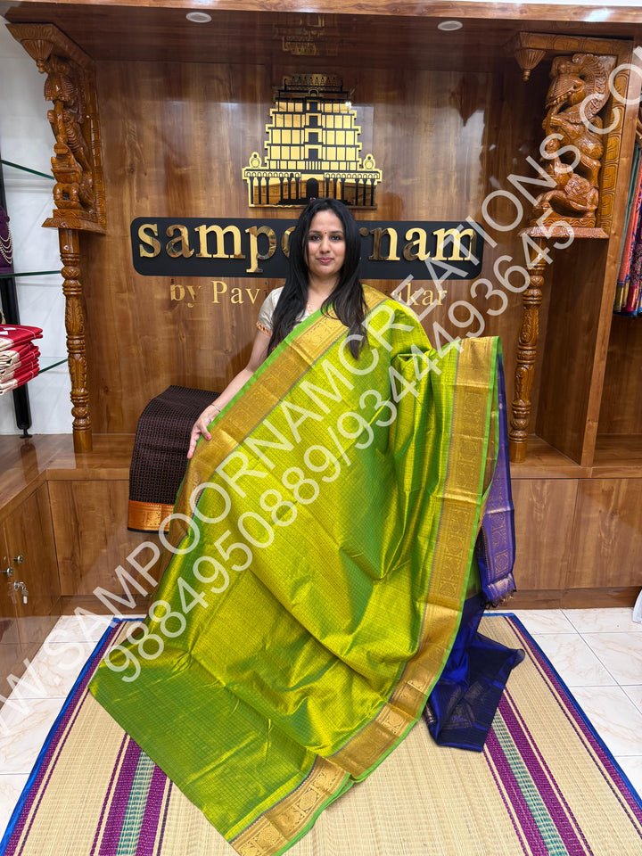 Leaf Green with Blue, Rich Traditional Borders and Lakshadeepam Thread Buttas all over the Body and Grand Pallu, Pure Silk Cotton Saree