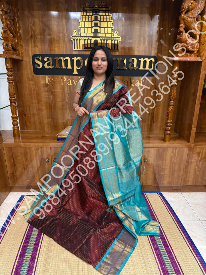 Dark Maroon with Turquoise Blue ,Rich Traditional Borders and Lakshadeepam Zari  Buttas all over the Body and Grand Pallu, Pure Silk Cotton Saree