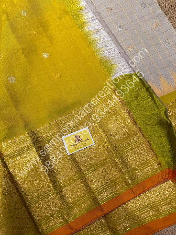 Offwhite with Lemon Green, Orange Selvedge, Rich Zari Checks in the body,Rudraksh Silver and Gold Zari Butta in the Body, Traditional Rich Borders with Temple Design and Grand Pallu, Pure Handloom Gadwal Silk Saree