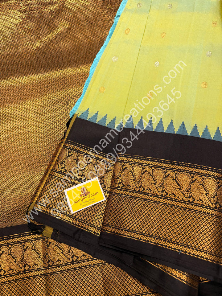 Pastel green with Black, Rich Silver and Gold Zari Butta in the Body, Traditional Rich Borders and Grand Pallu, Pure Handloom Gadwal Silk Saree