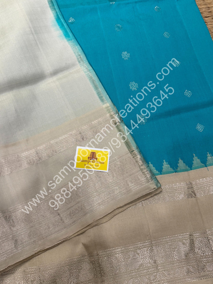 Aqua Green with Cement Colour, Rich Silver Zari Butta in the Body, Traditional Temple Rich Borders and Grand Pallu, Pure Handloom Gadwal Silk Saree
