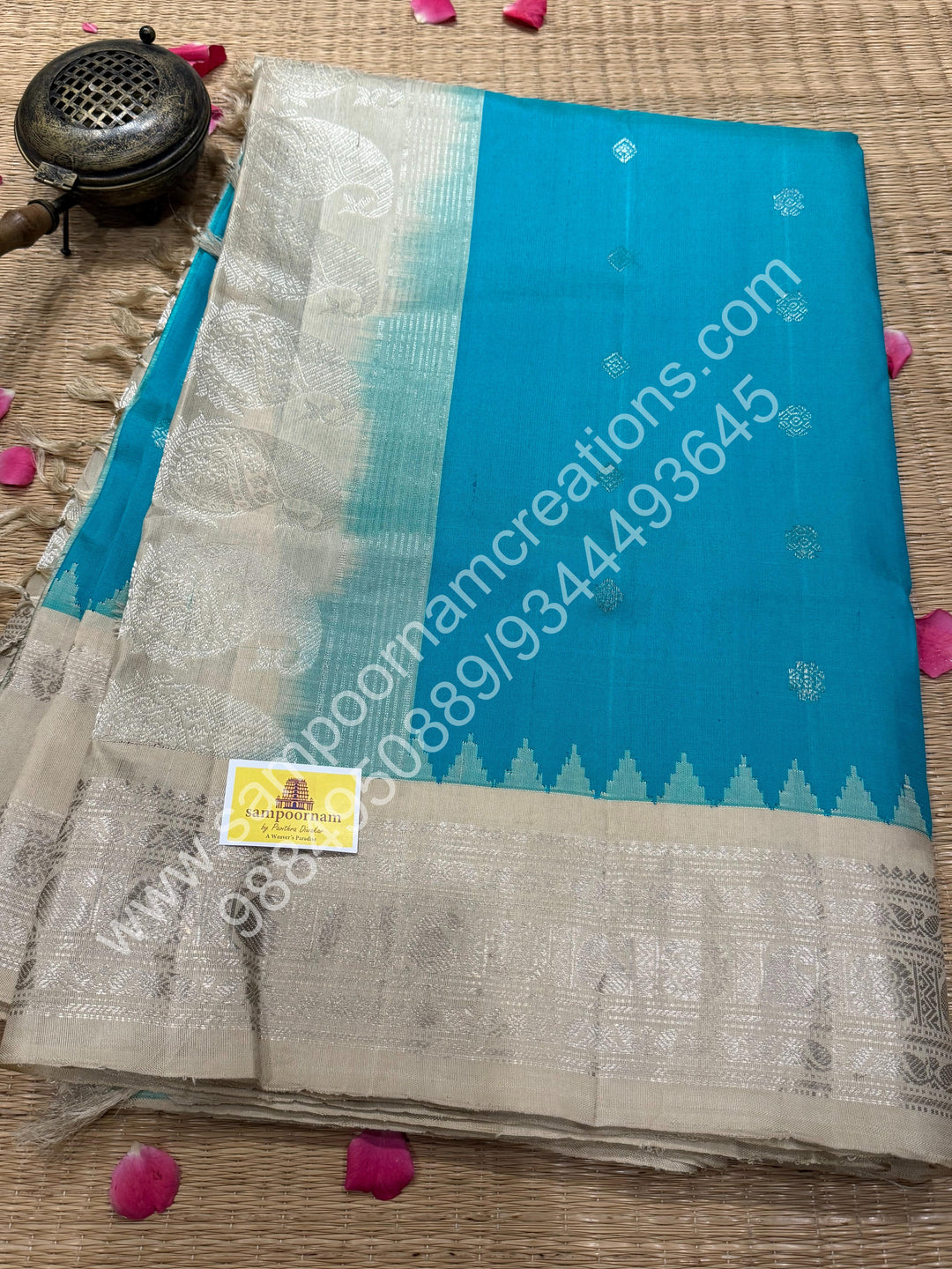 Aqua Green with Cement Colour, Rich Silver Zari Butta in the Body, Traditional Temple Rich Borders and Grand Pallu, Pure Handloom Gadwal Silk Saree