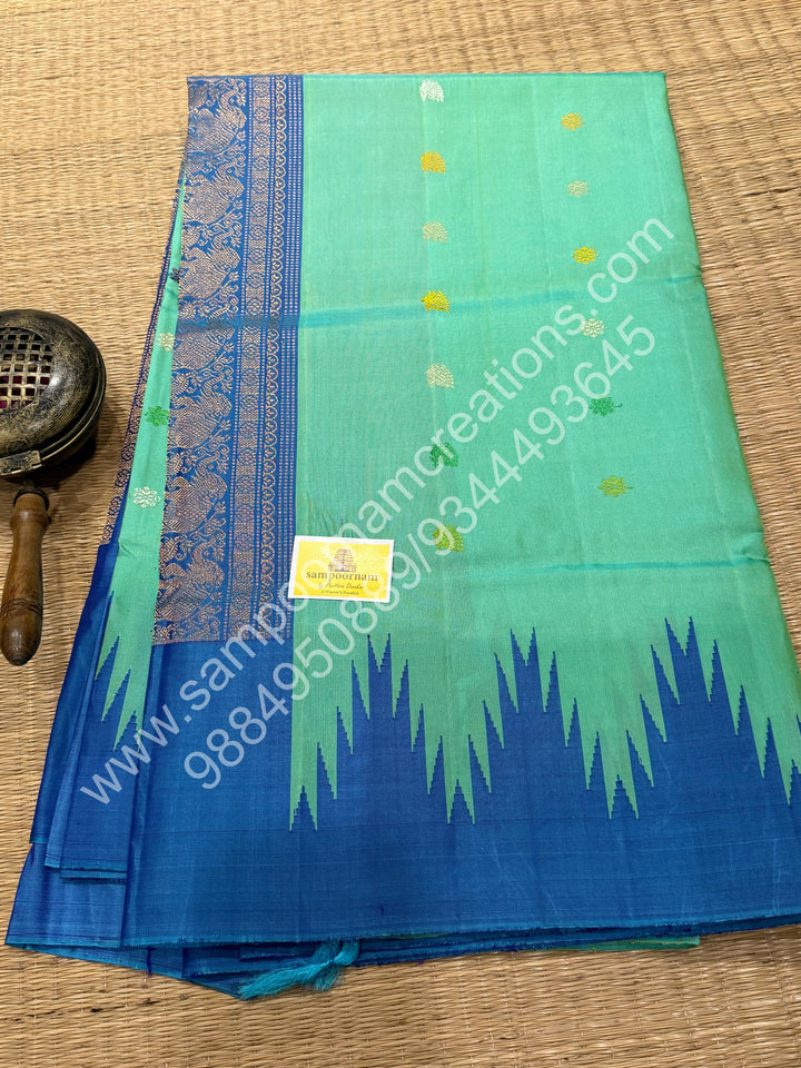 Double Shaded Pastel green with Blue, Rich Annam Multi Colour Butta in the Body, Traditional Temple Borders and Grand Pallu, Pure Handloom Gadwal Silk Saree