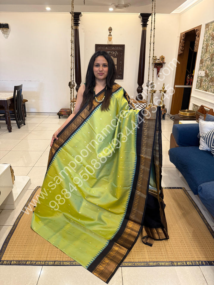 Pastel green with Black, Rich Silver and Gold Zari Butta in the Body, Traditional Rich Borders and Grand Pallu, Pure Handloom Gadwal Silk Saree