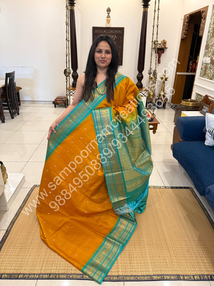 Manjal with Turquoise Blue, Rich Zari Butta in the Body, Traditional Zari Rich Borders and Grand Pallu, Pure Handloom Gadwal Silk Saree