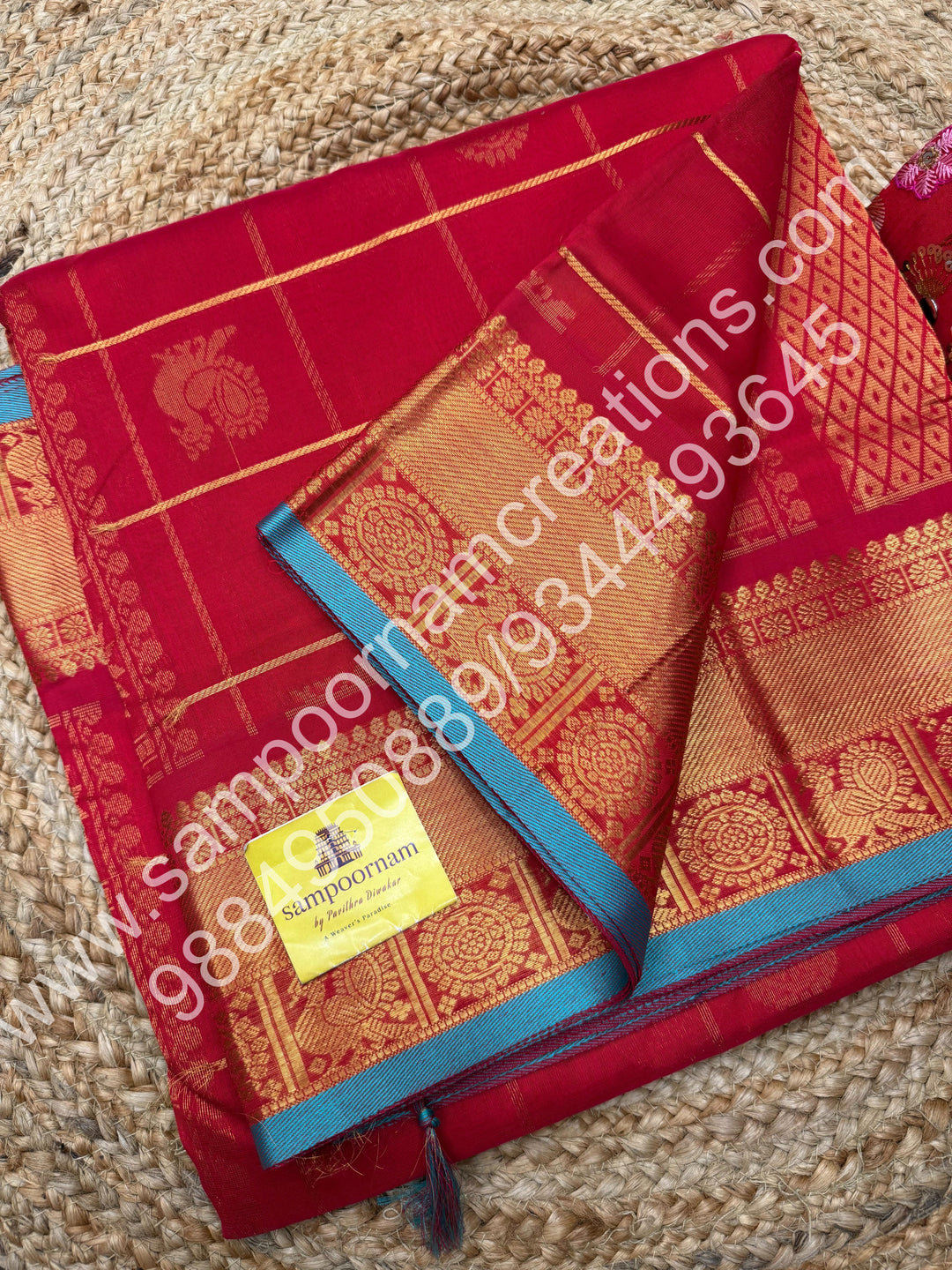Red with Blue Selvedge , rich zari checks in the body , with mayil and chakram butta , 10 yards silk cotton saree