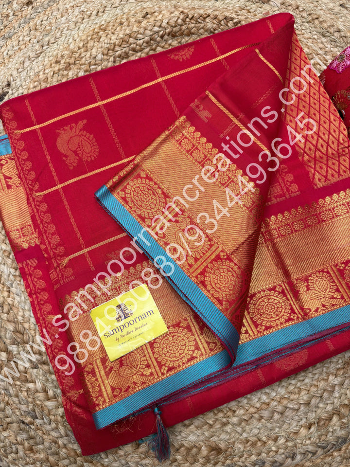 Red with Blue Selvedge , rich zari checks in the body , with mayil and chakram butta , 10 yards silk cotton saree