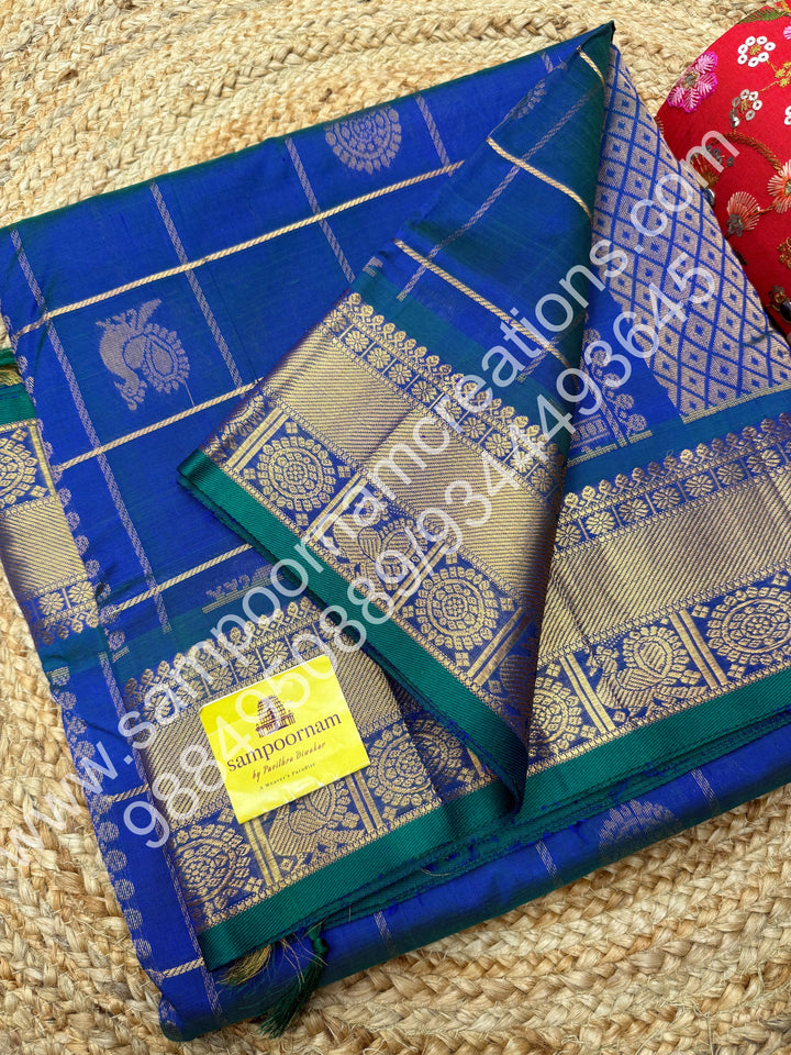 Double Shaded Mayil Kazhuthu Blue with Green  Selvedge , rich zari checks in the body , with mayil and chakram butta , Ten yards silk cotton saree