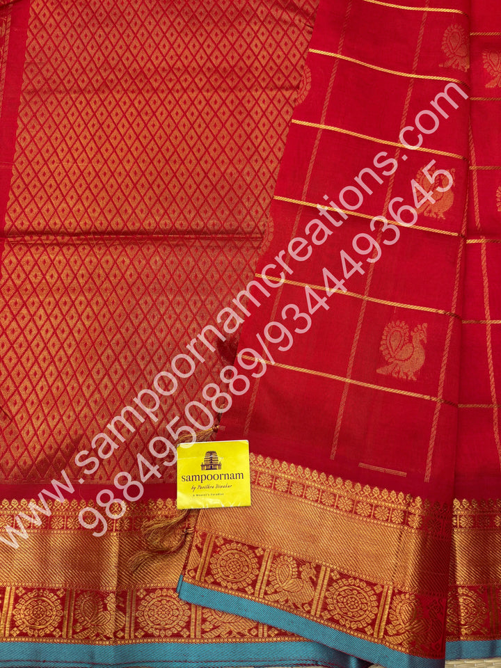 Red with Blue Selvedge , rich zari checks in the body , with mayil and chakram butta , 10 yards silk cotton saree