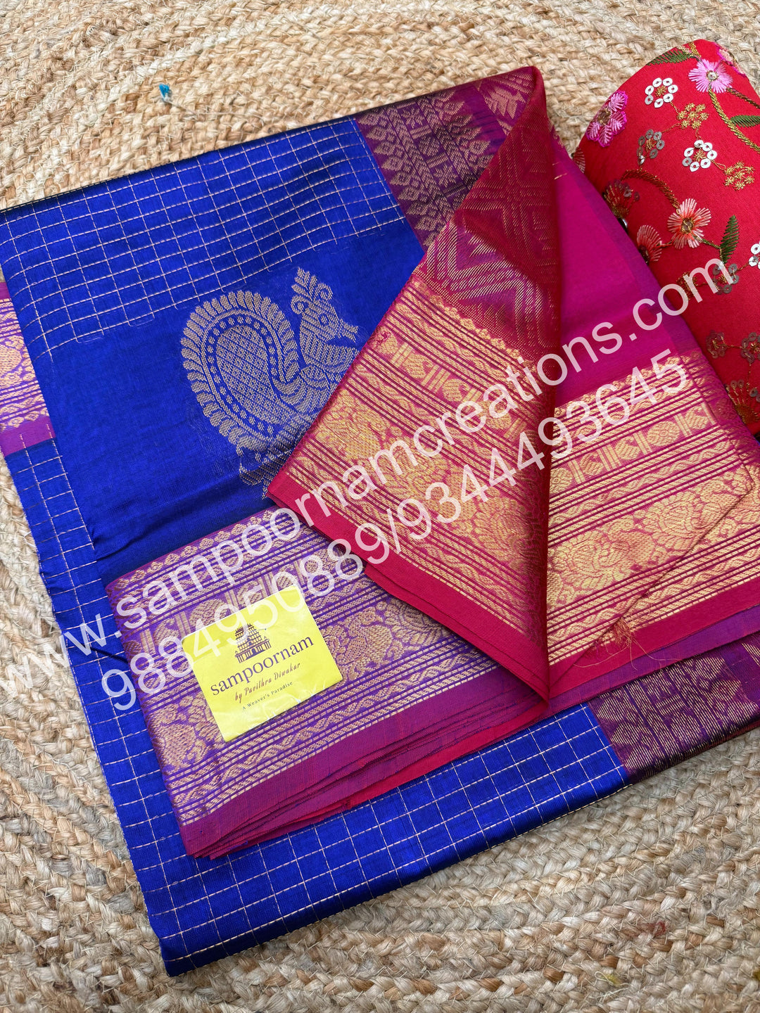 Blue with Magenta  Annam motif , zari buttu in the borders , zari checks in the body and rich Pallu Silk Cotton Saree
