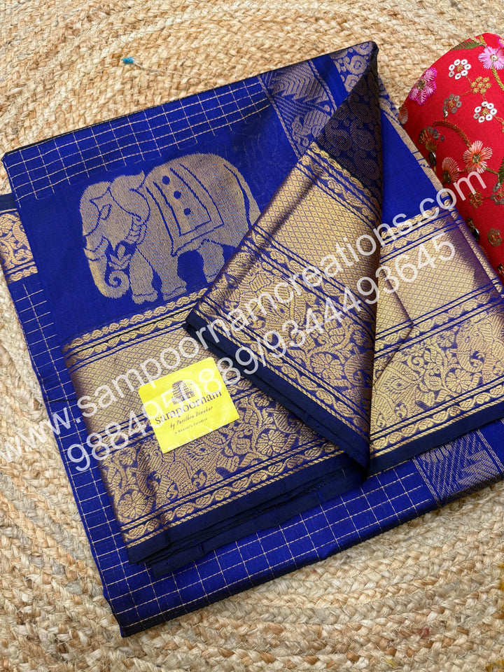 Royal Blue , Elegant Elephant zari buttu in the borders , zari checks in the body and rich Pallu Silk Cotton Saree