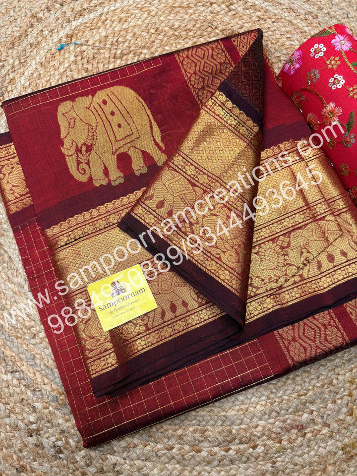Maroon  Elegant Elephant zari buttu in the borders , zari checks in the body and rich Pallu Silk Cotton Saree