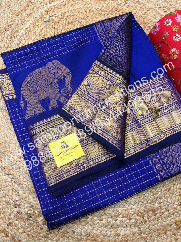 Indigo blue  Elegant Elephant zari buttu in the borders , zari checks in the body and rich Pallu Silk Cotton Saree